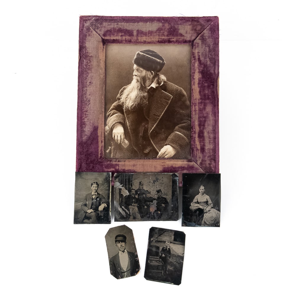 Victorian Portrait and Tintype Collection (6): This diverse 19th-century photographic assembly is anchored by a large, regal studio portrait of a bearded man in a traditional fur hat and heavy overcoat, housed in a rare period frame featuring