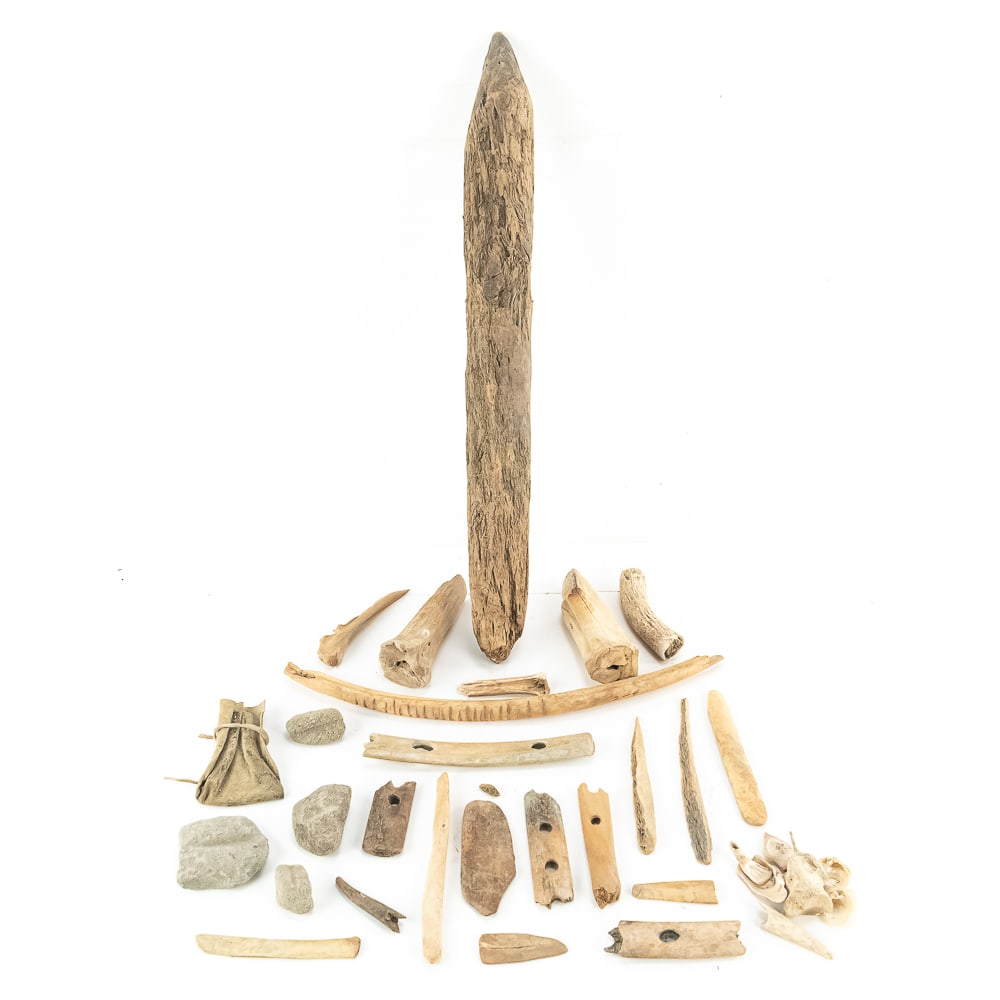 Primitive N. Am. Bone, Wood, Shell, Stone Tools: This diverse assemblage of indigenous artifacts represents a sophisticated kit of domestic and utilitarian tools, primarily featuring worked bone, wood, and tanned hide. The centerpiece of the