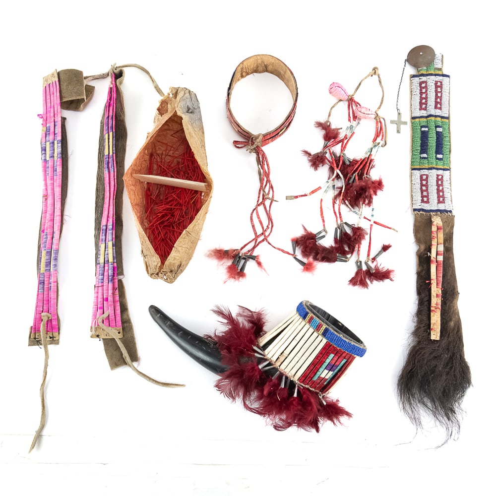Plains Native American Regalia Group: This striking collection of Plains-style regalia showcases the intricate artistry of porcupine quillwork and glass seed beads, likely dating from the mid-to-late 20th century. The assembly includes a