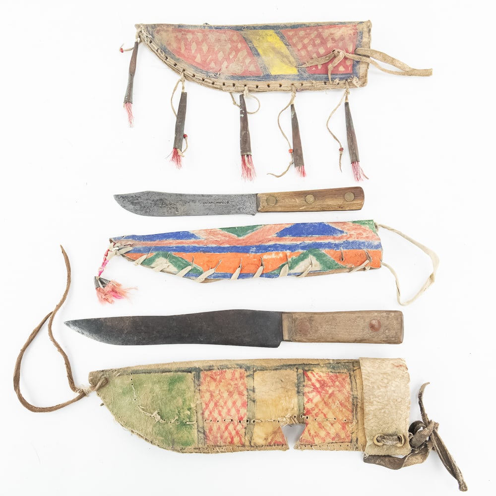 3 Native American Style Knives & Sheaths: This collection features three hand-crafted, Native American style knife sheaths accompanied by two utilitarian fixed-blade knives. The sheaths are constructed from heavy rawhide, showcasing