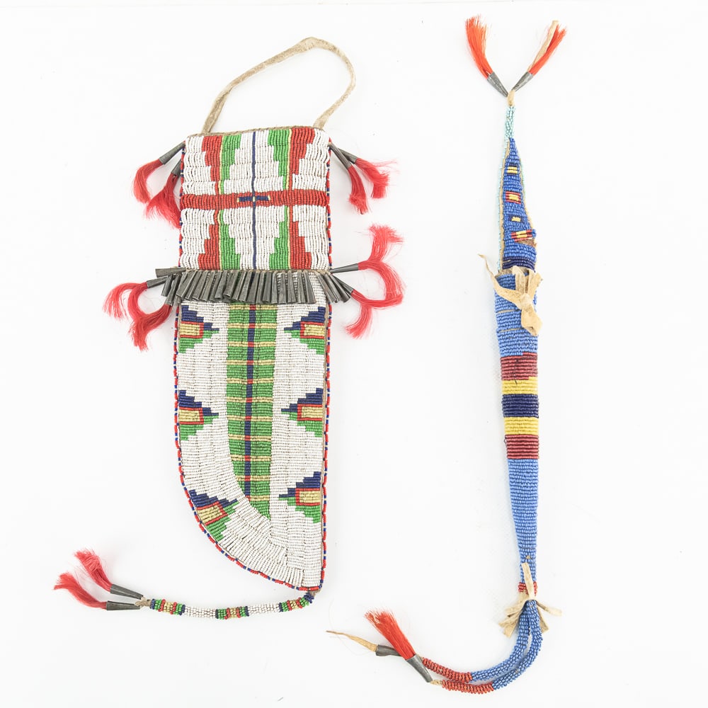 Native American Beaded Sheath & Case: This striking set showcases the vibrant artistry of the Plains tribes, likely reflecting late 19th to early 20th-century craftsmanship. The set includes a large, fully beaded knife sheath featuring a
