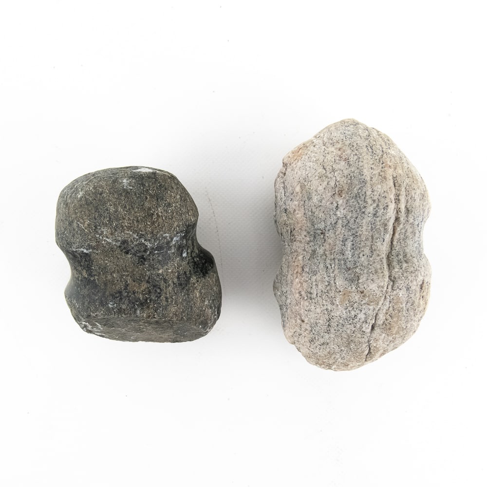 Native American Full-Grooved Stone Mauls (2): This pair of authentic prehistoric artifacts represents the "Full-Grooved Maul" tradition of North American lithic technology. The larger specimen is carved from Banded Gneiss, a metamorphic rock
