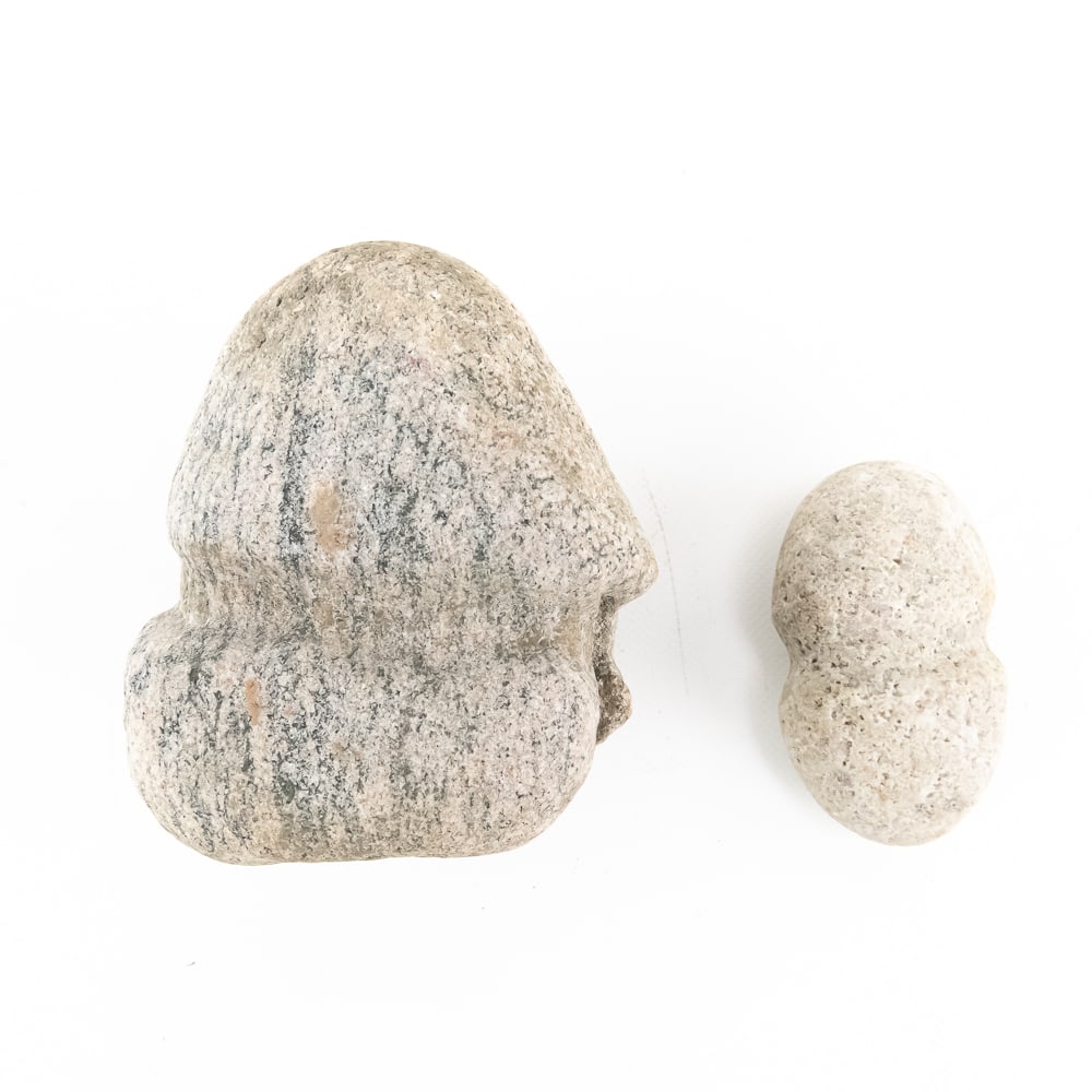 Pair Prehistoric Grooved Stone Mauls (2): This remarkable pair of North American lithic tools highlights the utilitarian craftsmanship of prehistoric indigenous cultures, likely dating from the Archaic to Woodland periods. Crafted from