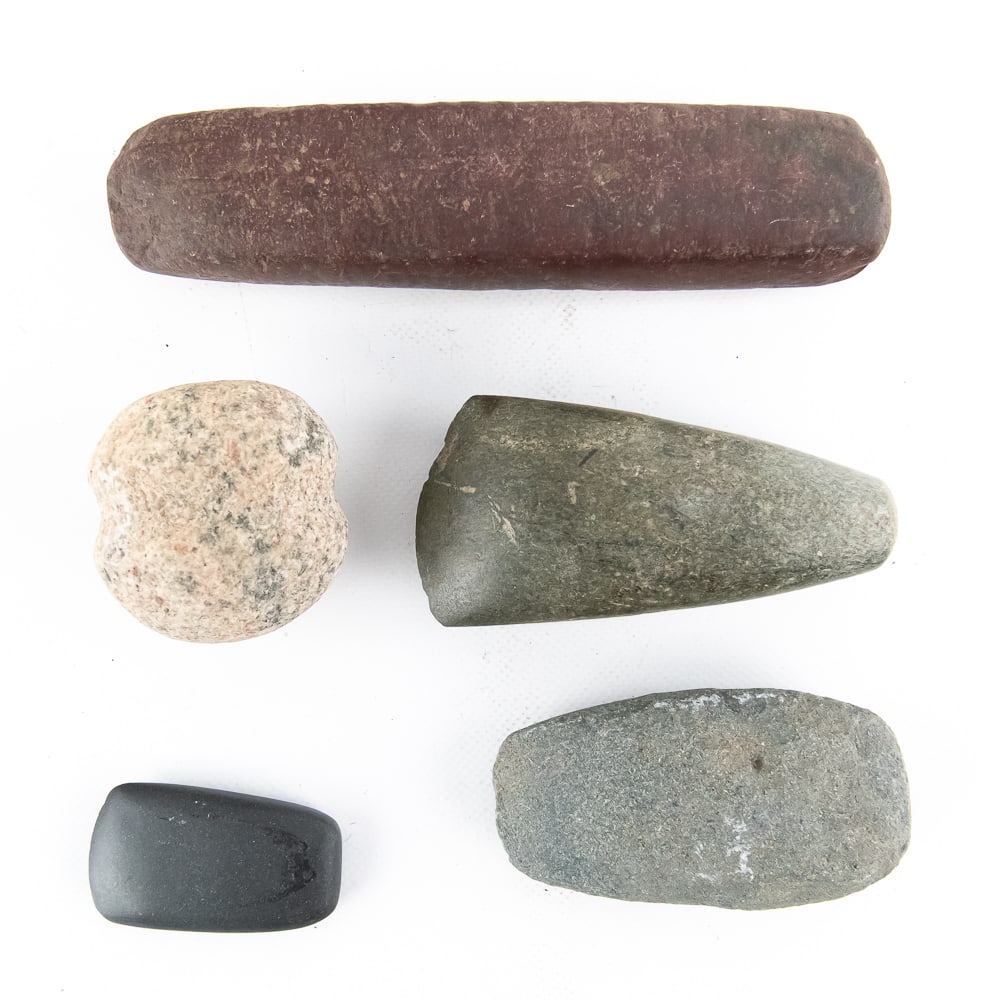 Ancient Ground Stone Tool Collection (5): This refined five-piece collection features a standout 7.5" rectangular stone celt carved from a dense, non-porous siltstone. While it does not "ring" like high-silica stone, its smooth, polished