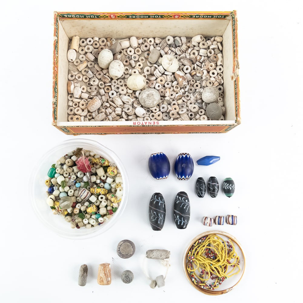 Ancient & Modern Mixed Bead Collection: This expansive collection offers a fascinating journey through bead history, featuring a heavy concentration of ancient-style stone and bone "disk" and "cylinder" beads alongside vibrant glass trade
