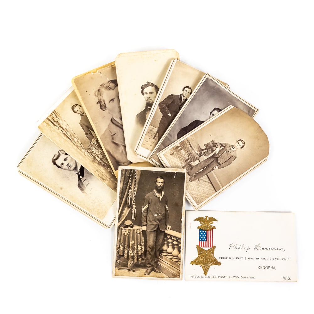 Civil War Era CDVs & Philip Harman Card: This collection offers a poignant glimpse into the mid-19th century, featuring nine Cartes de Visite (CDV) and a unique business card for Philip Harman of the 1st Wis. Inft. The lot includes four