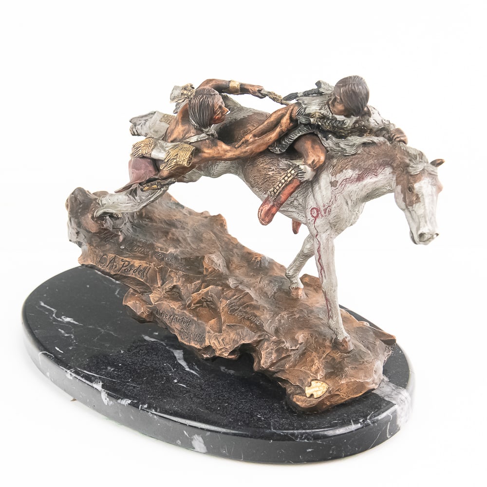 C.A. Pardell Sculpture-Unexpected Rescuer 177/950: This dynamic mixed media sculpture by renowned artist Christopher A. Pardell, titled "Unexpected Rescuer" and produced by Legends in 1991, masterfully captures a thrilling narrative of a Cheyenne