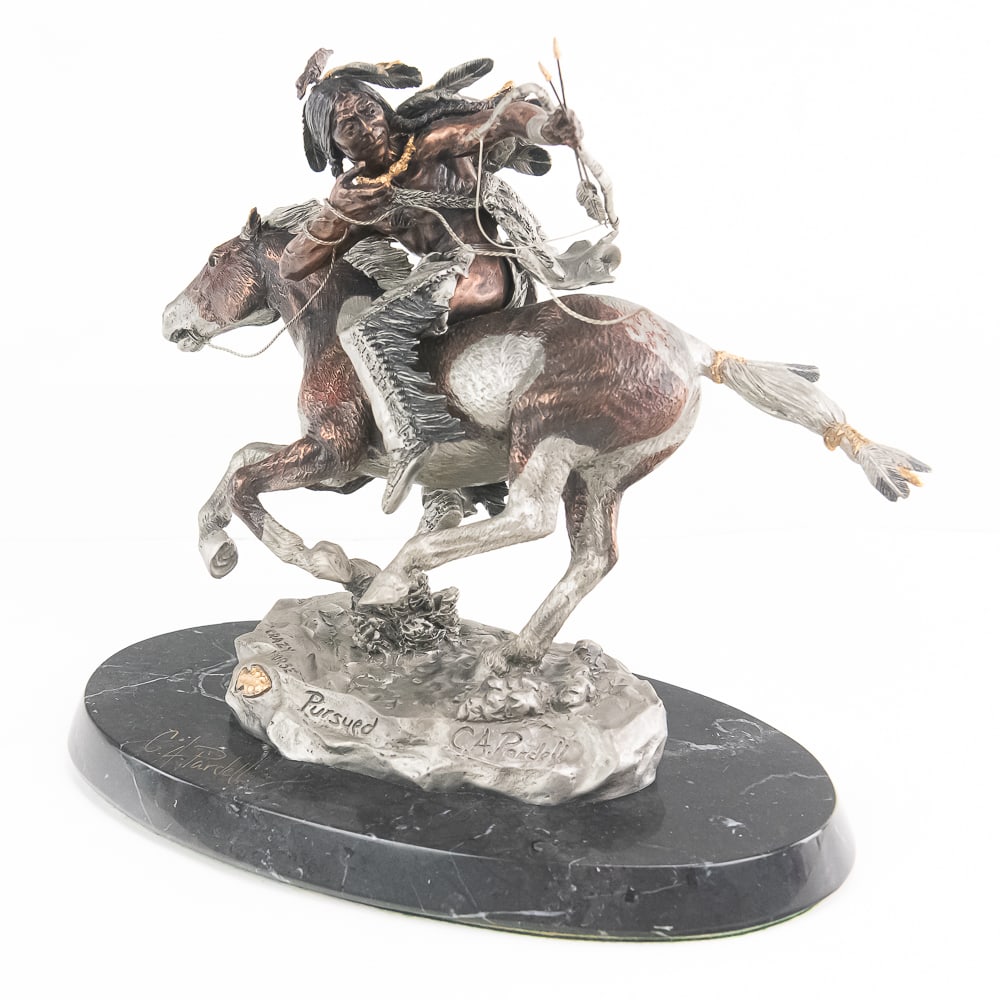 C.A. Pardell "Pursued" Pewter Sculpture 398/750: This dynamic mixed-media fine pewter sculpture, titled "Pursued," is a masterfully crafted work by renowned artist Christopher A. Pardell for Legends. Depicting the legendary Lakota leader Crazy