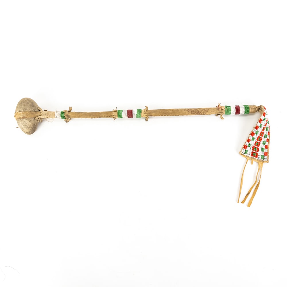 Beaded Plains Indian Stone War Club: This striking Plains Indian style war club features a heavy, double-pointed stone head secured to a wooden haft with meticulously stitched rawhide. The handle is fully encased in rawhide and adorned