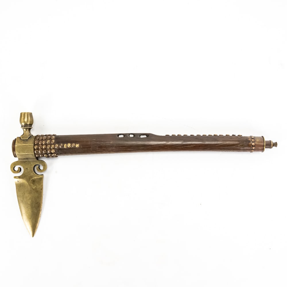 Contemporary Ornate Brass Pipe Tomahawk: This is a high-quality contemporary reproduction of a 19th-century trade-style pipe tomahawk, likely produced for the ceremonial or reenactment market. The ornate cast brass head features a leaf-shape