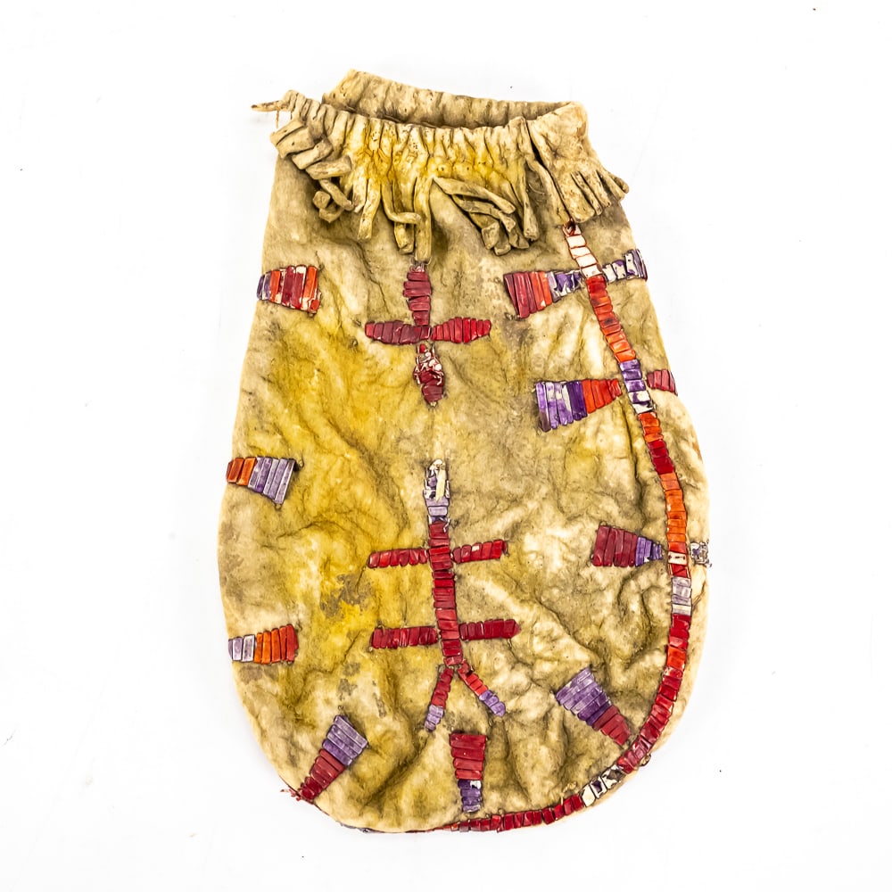 1870-80 Sioux Quilled Leather Pouch: From the perspective of a historian of the Great Plains, this pouch is a stunning representative of Sioux material culture during the transition to the reservation era. Hand-crafted from brain-tanned 