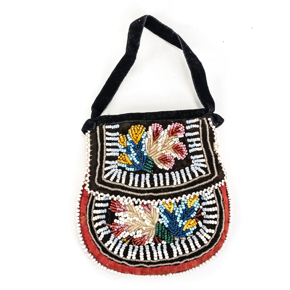 Antique Iroquois Beaded Velvet Bag: This striking piece is a classic example of Haudenosaunee (Iroquois) raised beadwork, likely dating to the late 19th or early 20th century. Crafted for the Victorian tourist trade, this "souvenir"