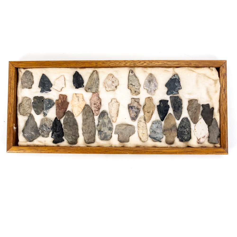 35 Wabash River Valley Projectile Points: This comprehensive collection of 35 Native American projectile points was recovered from the Wabash River Valley in Indiana, a region rich in prehistoric lithic history. The assemblage showcases a
