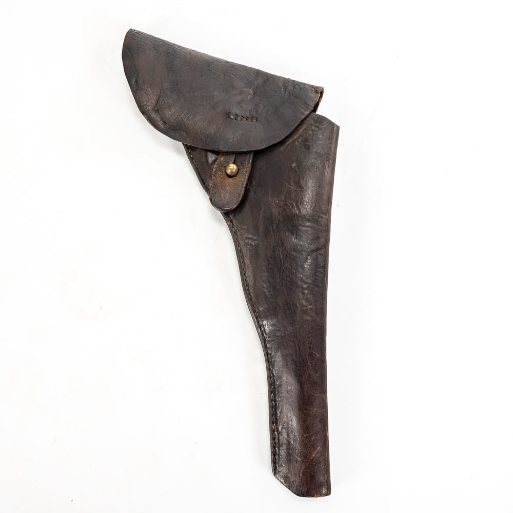 Civil War Era Leather Cavalry Holster: This is a classic example of a mid-19th-century military sidearm holster, consistent with those issued to cavalry units during the American Civil War. The piece is constructed from a deep, dark brown