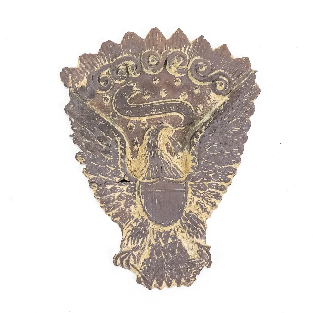 Civil War Era Eagle Hardee Hat Plate: This stamped brass insignia is a classic 1858 Pattern eagle plate, commonly known as a "Hardee Hat" plate, which served as the standard headgear adornment for Union enlisted men during the American