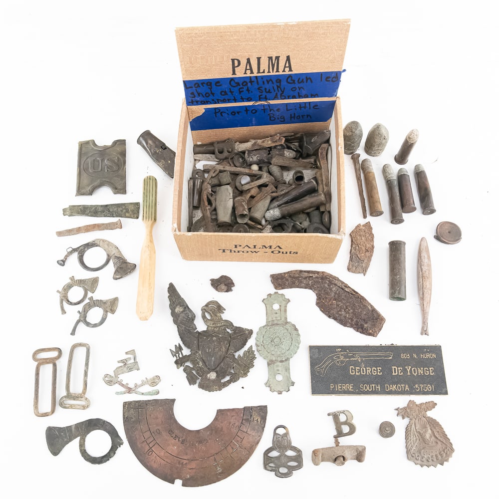 Dug Indian Wars Large Insignia & Relic Lot: This exceptional, dug Indian Wars archaeological collection features approximately 33 military and civilian buttons (including a prominent Baltimore City Police button), 5 infantry bugle horn