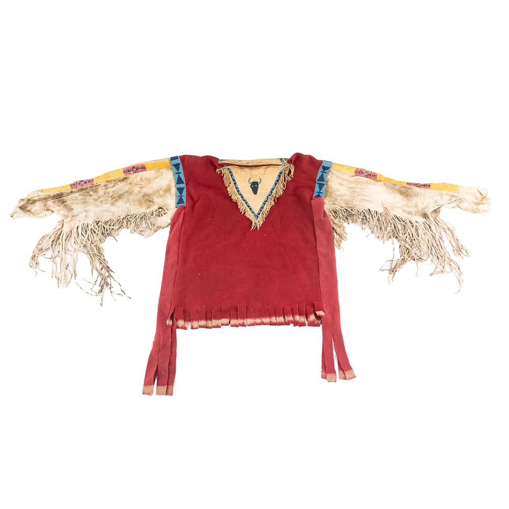 Native American Style Red Wool Shirt: This Plains-style Native American inspired shirt features a vibrant red wool body accented by a V-shaped buckskin yoke on the front, adorned with a beaded bison/buffalo head motif and framed by blue, 