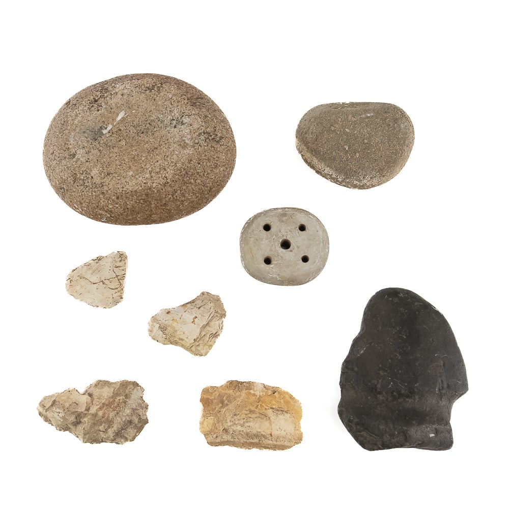 Indigenous Stone Tool & Lithic Collection: This fascinating assemblage features an array of prehistoric and early indigenous utilitarian objects, highlighted by a substantial stone mortar (metate) paired with a hand-held grinding stone