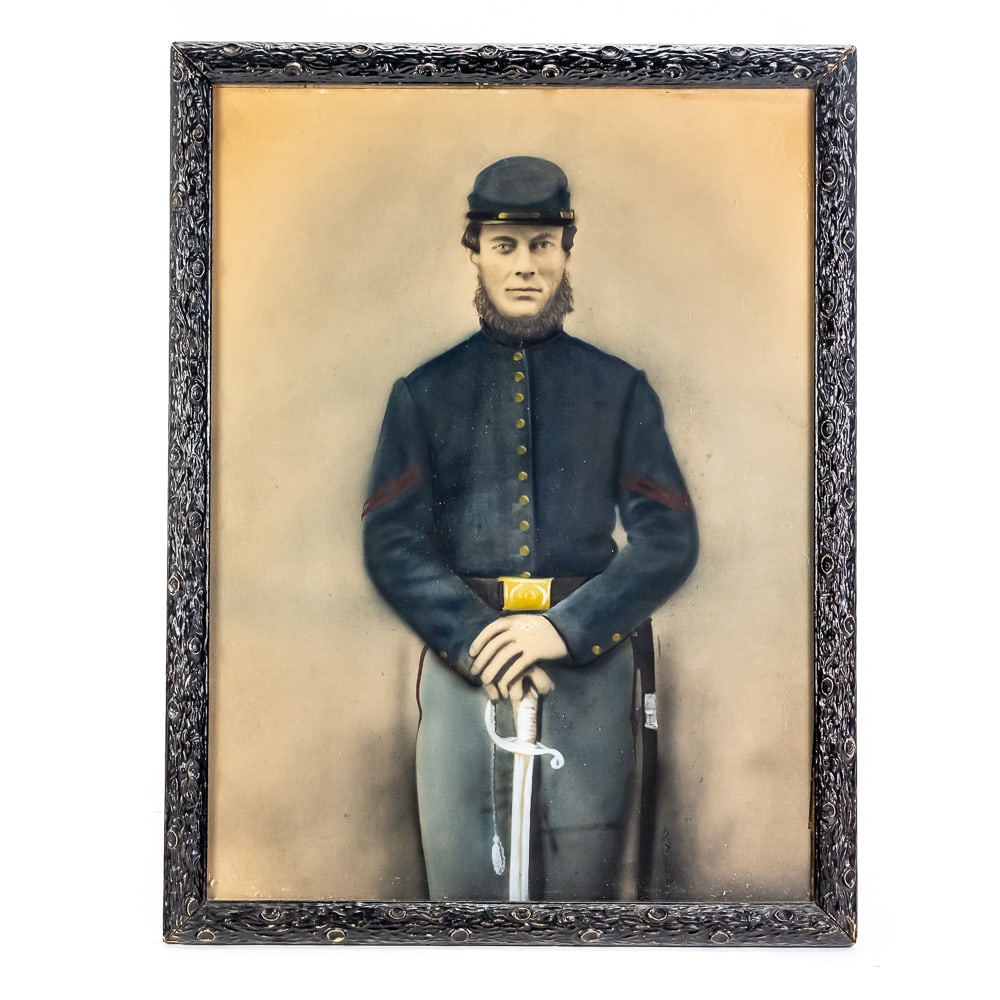 Civil War Union Artillery Cpl. Portrait: This evocative Civil War-era portrait captures a Union Artillery Corporal, identified by the provenance tag as B. Kalitski of New York. This piece is a classic "solar enlargement," a period