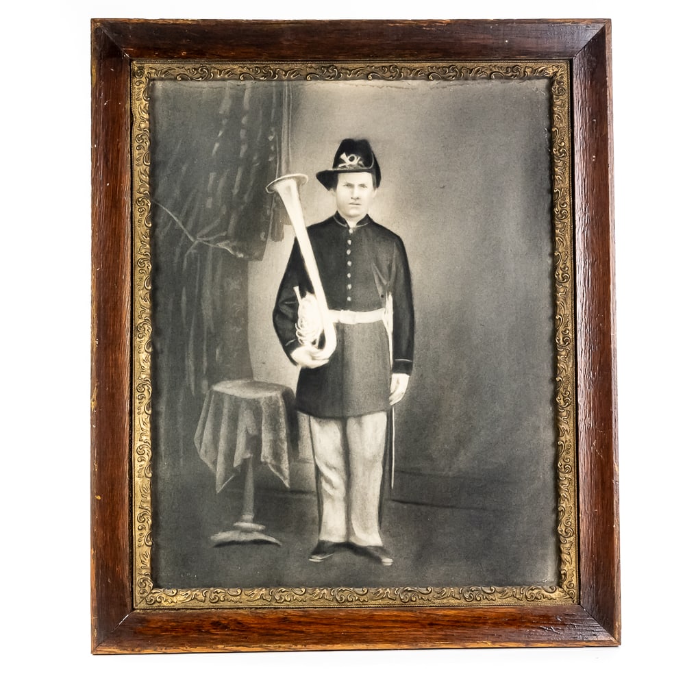 Framed Civil War Union Saxhorn Musician Portrait: This captivating piece is a hand-colored charcoal or "crayon" portrait, a popular style in the late 19th century used to enlarge and enhance smaller Civil War-era photographs. It depicts a young