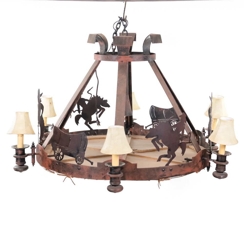 Iron Cowboy Western Chandelier: 64533C1600800/1500/3000Due to the size/weight/fragility of this item, it will require a pick up or customer-arranged 3rd-party shipping. We will connect you with reputable transport companies after