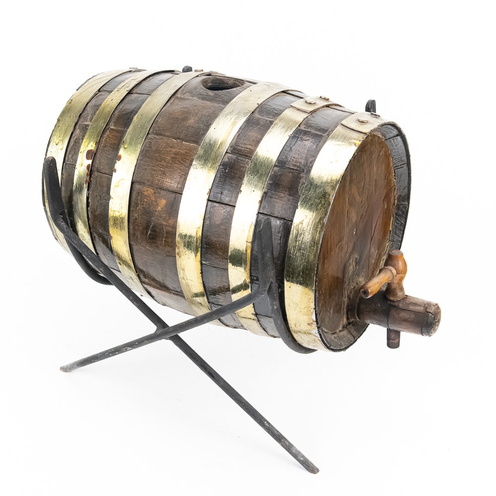 Antique Mini Oak Keg with Stand: This is a charming late 19th to early 20th century miniature wooden keg on a steel stand. The rich, dark-stained wood staves are held by shiny brass-plated metal bands, giving it a distinguished