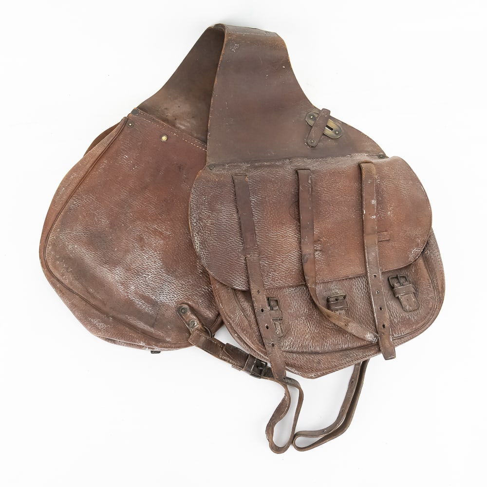 1918 Spalding Leather Horse Saddlebags: These authentic WWI-era leather saddlebags, manufactured by the renowned A.G. Spalding & Bros., are a rare find for cavalry or military collectors. Dated 1918, these bags feature heavy-grain leather