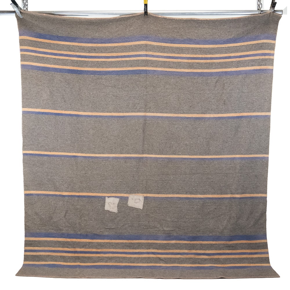 Mid-20th C Institutional Wool Blanket: An authentic and heavy Mid-20th Century Institutional Wool Blanket, this piece is a prime example of high-utility textiles manufactured for barracks or hospital use. The robust, tight-knit