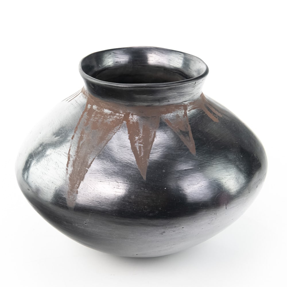 Blackware Pueblo Pottery Jar, Polished: This is a striking example of a traditional Native American Blackware Pueblo pottery jar, likely from a New Mexico Pueblo such as Santa Clara or San Ildefonso, famous for this highly-polished style.