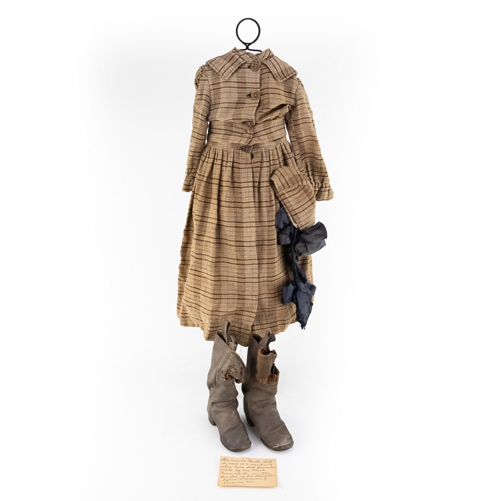 Antique 1886 Doll Dress & Boots: This captivating lot presents a historical ensemble: an antique doll dress, hat, and boots with known provenance. The handwritten note identifies the garments as having been made by Mrs. Frank