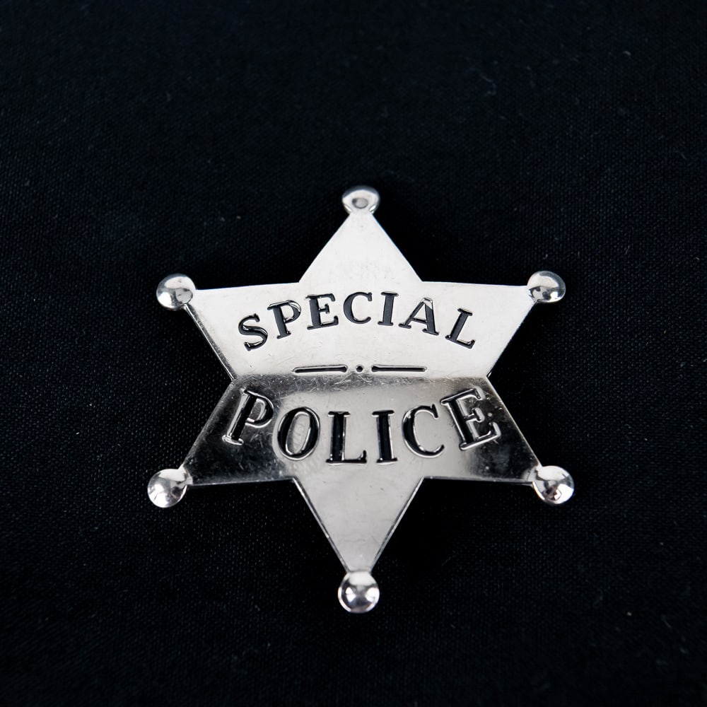 Vintage Special Police Star Badge: This is a very nice example of a vintage special police star badge—a classic six-pointed 'sheriff-style' star, likely cast from a nickel-plated or chrome-plated white metal alloy, which was