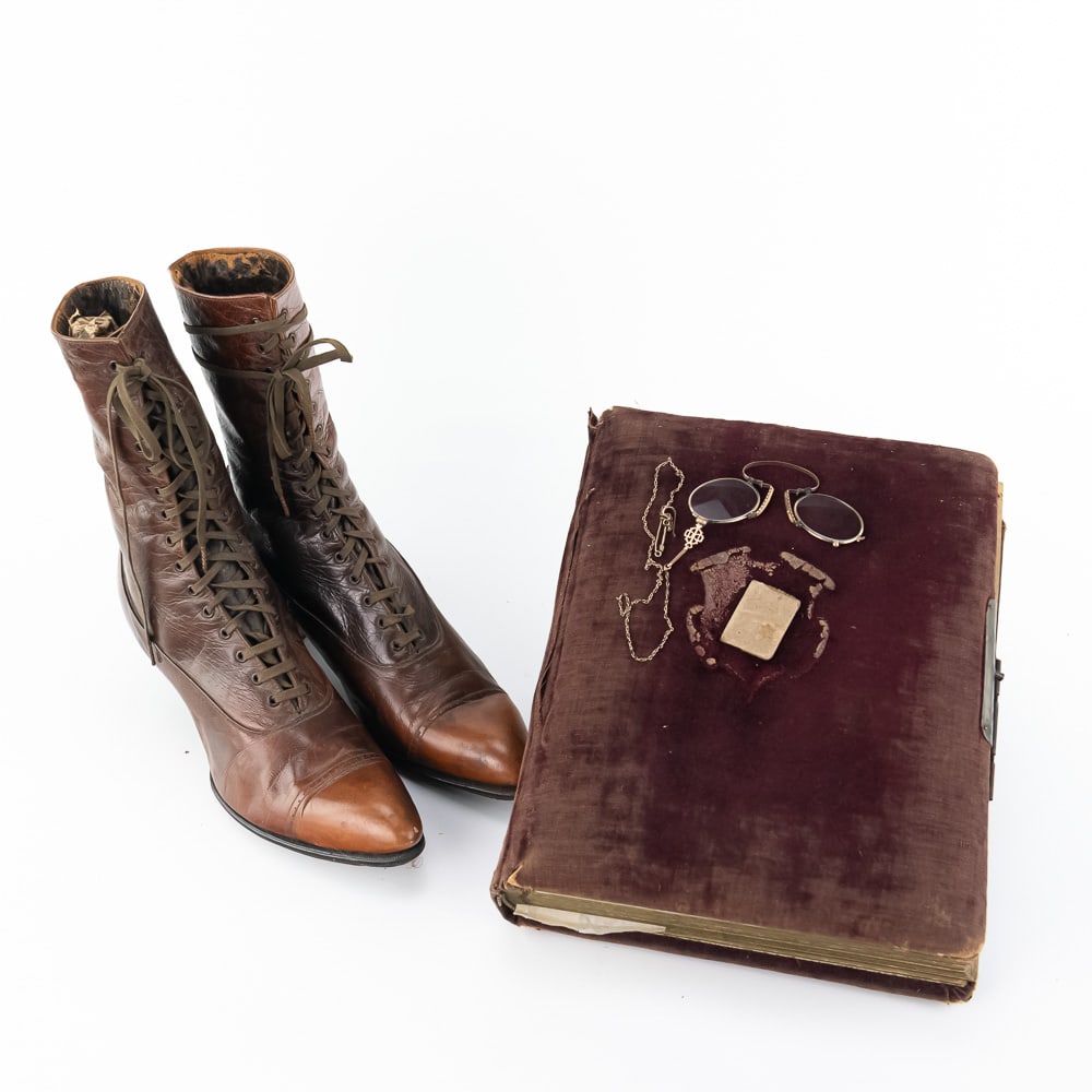 Victorian Ladies Shoes, Eyeglasses, Photo Album: This is a beautiful collection of late 19th-to-early 20th-century family history, centered around a stunning Victorian photo album. The album itself is bound in a deep red velvet, brass clasp