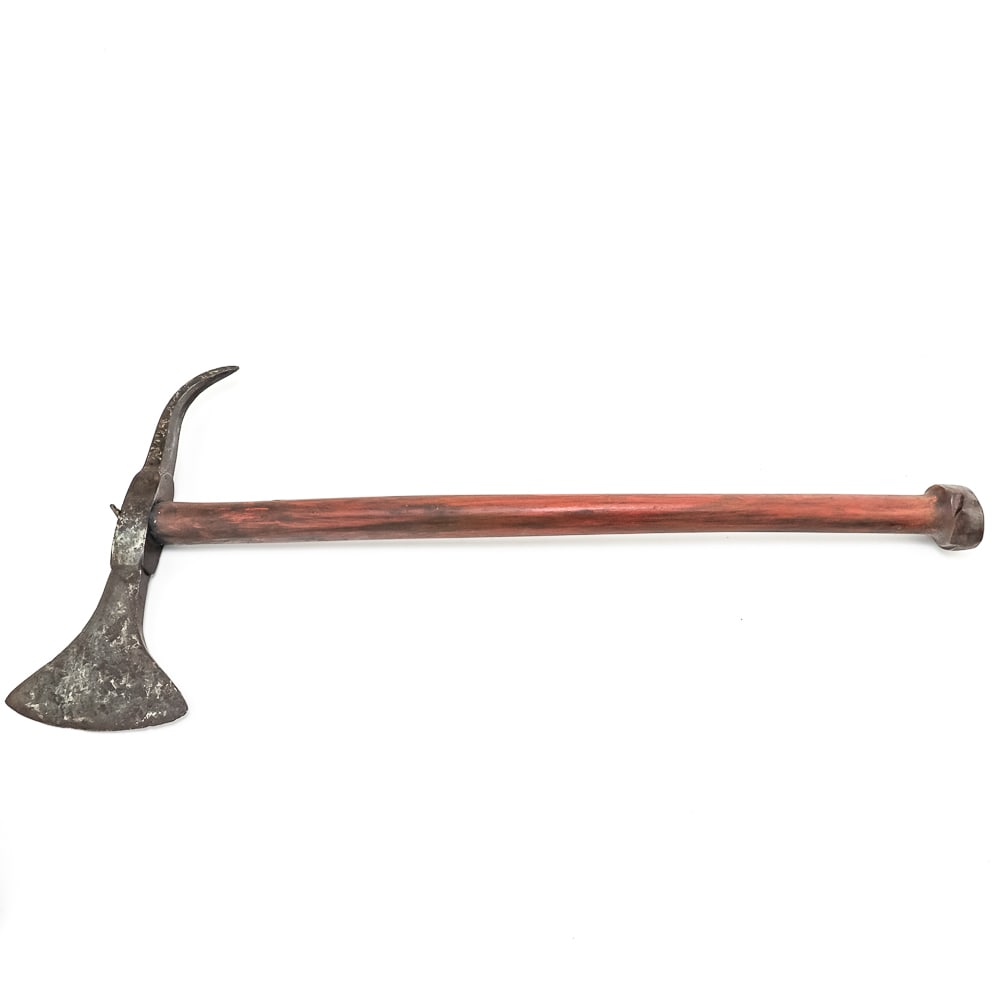 1820s Cast Iron Tomahawk - Handle Replaced: This 1820s cast iron tomahawk features a robust hand forged head with prominent cutting edge and rear spike. The hardwood handle stained a deep reddish brown is likely a replacement. Axe head pinned t