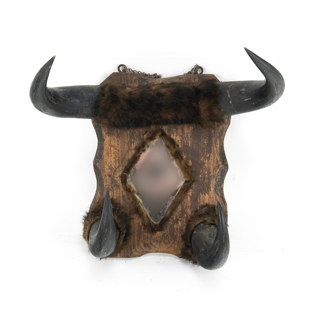 Vintage Buffalo Horn & Fur Mirror: Hand-crafted with the rugged spirit of the American West, this unique wall mirror features four authentic buffalo (Bison) horns mounted to a hand-shaped, scalloped wood plaque. The top horns sweep out