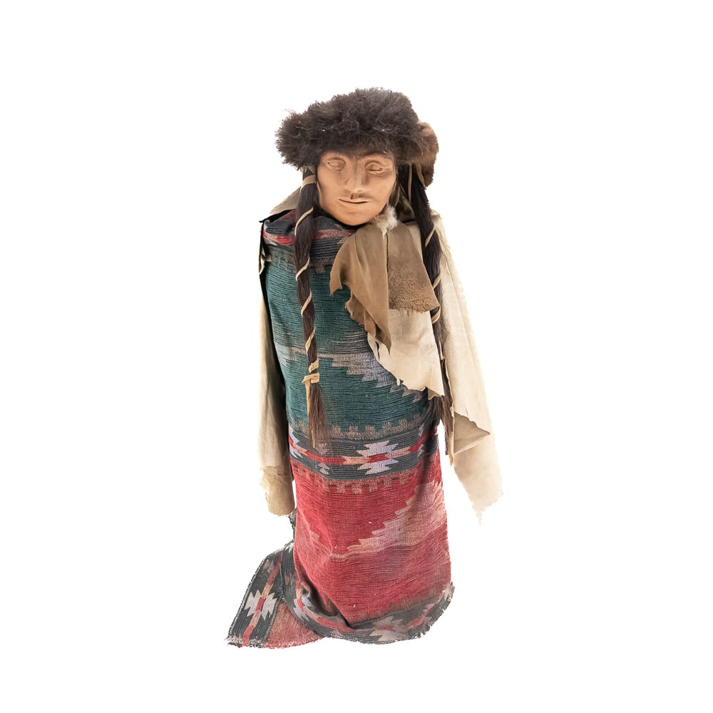 Large Indian Display Figure: This striking piece is a contemporary display figure, likely created in the late 20th century, designed to represent a Native American chief or elder. The figure's body is a large, cylindrical log whi
