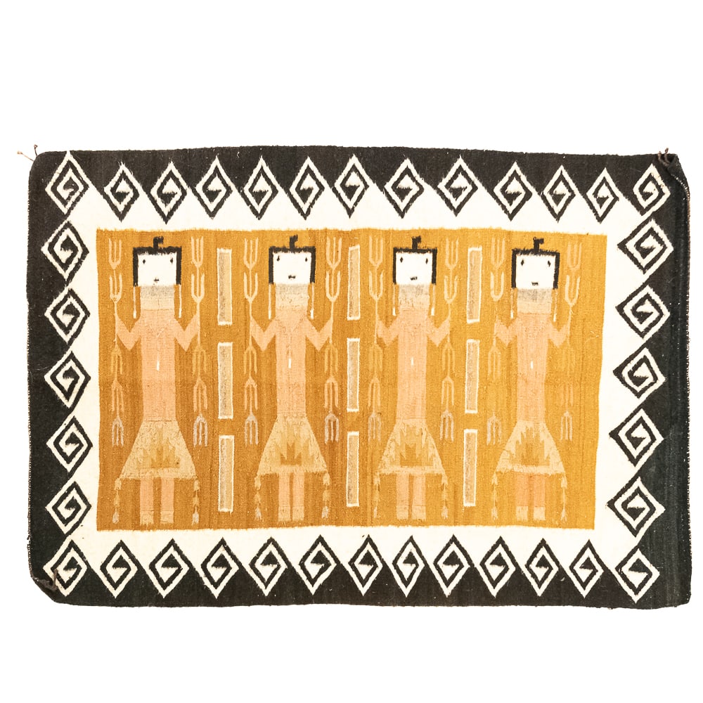 Navajo “Ye Be Chei” Hand Woven Rug: This mid- 20th Century Navajo hand-woven “Ye Be Chei” rug. It features a central panel of stylized dancers in the Navajo Nightway ceremony with their characteristic masks, kilts and