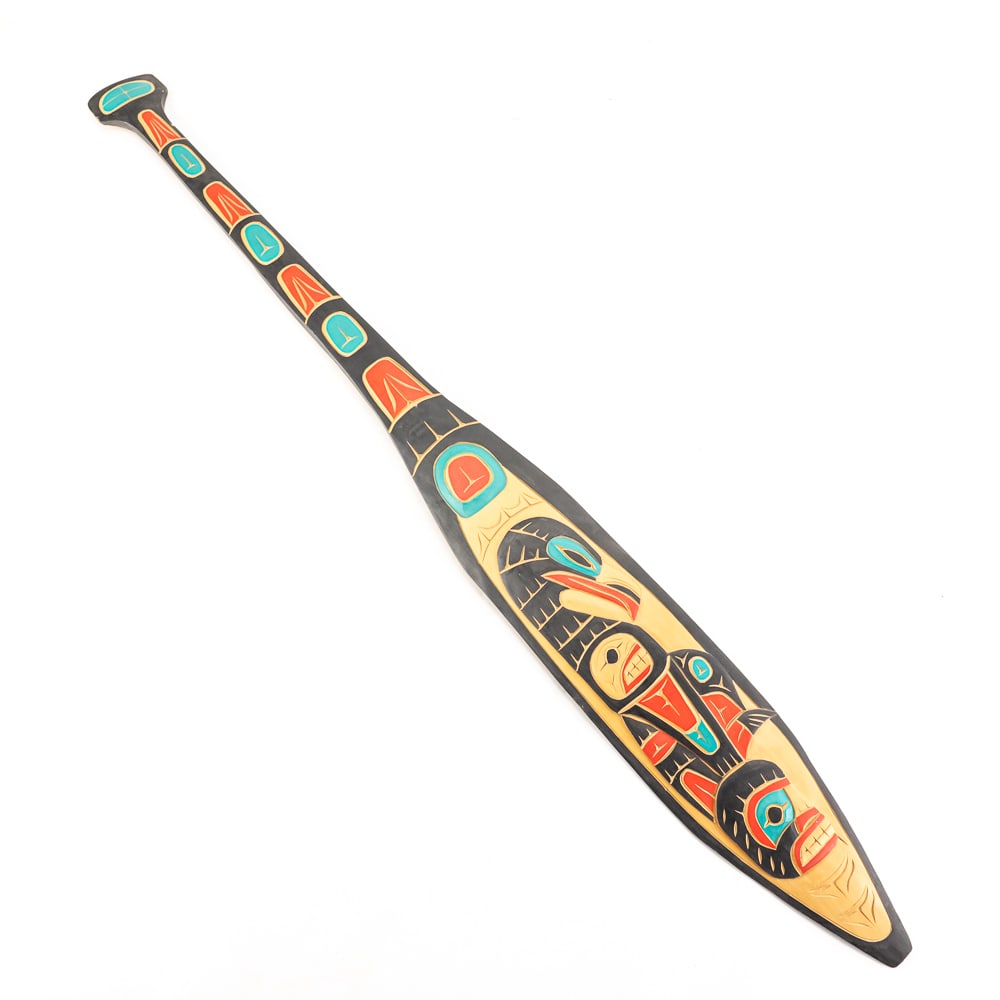Jim Yelton Raven Wild Man Native American Salish: Collection features 48" Northwest Native American Hawaiian Style carved "Raven Wild Man" Salish paddle. Presents extremely well with attractive colorful design, reverse reads Jim Yelton Raven Wild