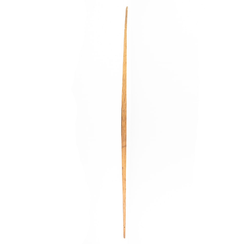 Northern Plains Bow: This Native American Northern Plains bow measures approximately 60” length. Constructed from a single piece of wood, possibly Osage or Hickory- materials traditionally favored for their