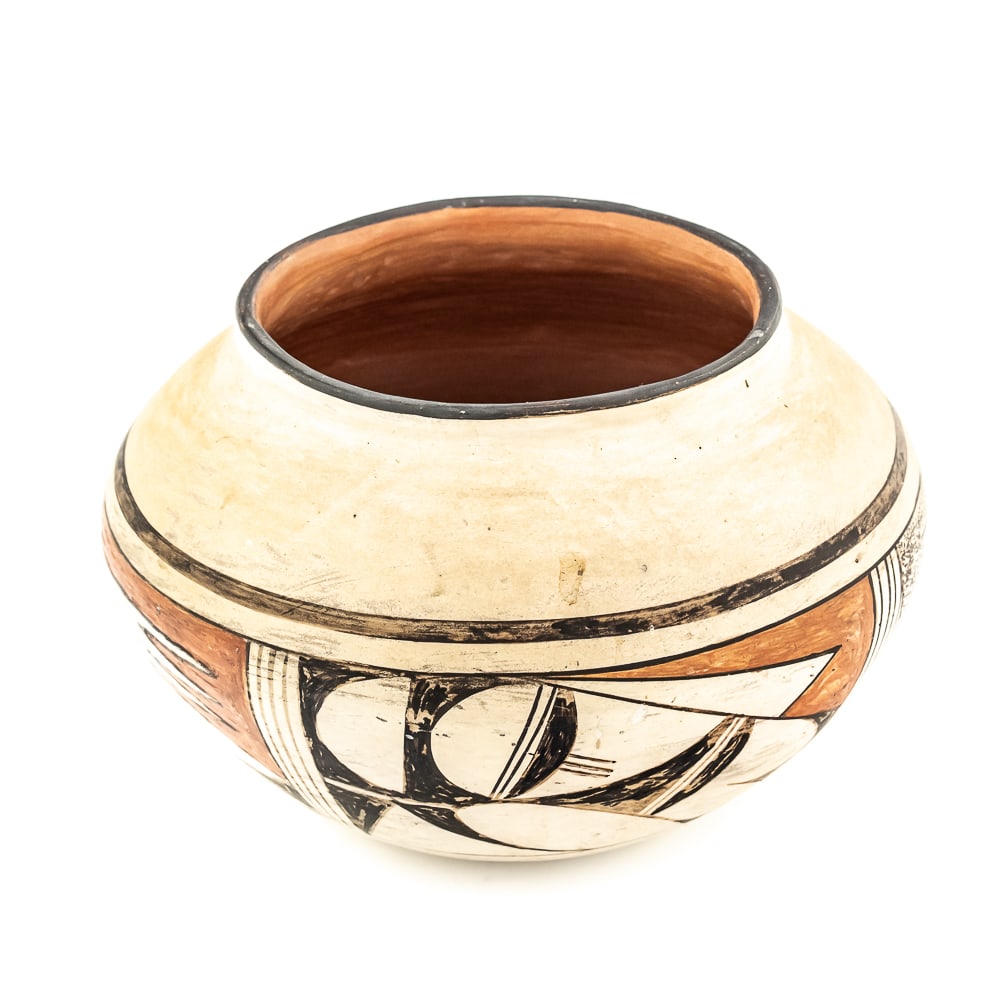 1971 Hopi Polychrome Pot: Vintage Hopi hand coiled, polychrome pot. Decorated with red and black designs typical of Hopi pottery. Decoration, specifically the dark features exhibit varying levels of either completion or touch