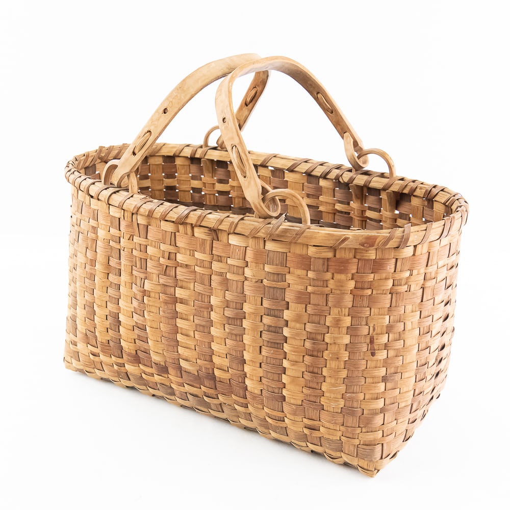 1940s Chitimacha Basket: Unadorned Chitimacha basket, a traditional craft of the Chitimacha Tribe of Louisiana circa 1940’s. Known for their intricate designs and use of natural materials, primarily river cane, this