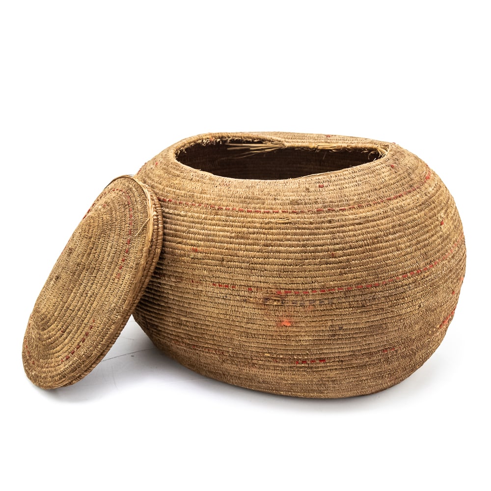 1890s Eskimo Mingqaaq Basket: This circa 1890s Mingqaaq basket is a type made by the Inuit people of the Arctic and subarctic regions for tourist trade. These baskets are made using a tight coiling technique which makes them