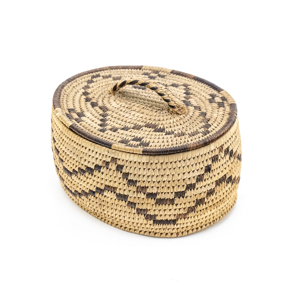1950s Papago Tohono O'odham Trinket Basket: This trinket basket circa 1970s was made by the Tohono O’odom people, formerly known as the Papago tribe, native to the Sonoran Desert in Arizona and Mexico. This particular piece has a wave