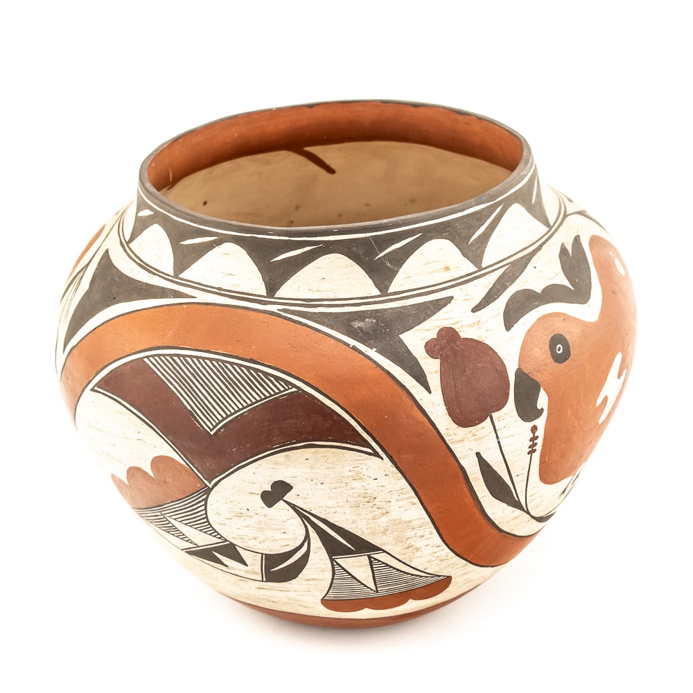 1950s Acoma Pueblo Polychrome Pot-Signed: This four-color polychrome pot was made at Acoma Pueblo, NM, and attributed to the 1950s. It is a two parrot design with colors and imagery typical of pottery from Acoma. The colors featured are orang