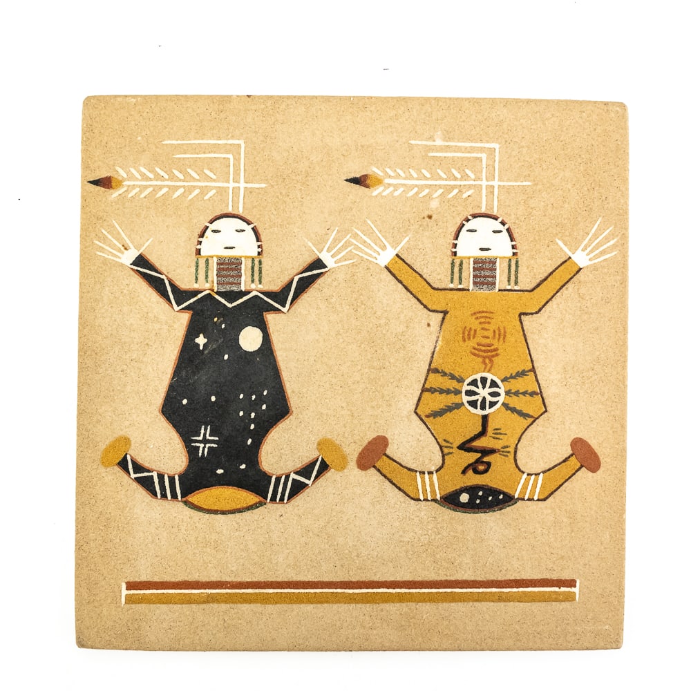 Navajo Sand Painting, New Mexico: Navajo sand painting created in the mid to late 20th century. Depicts 2 figures- Mother Earth and Father Sky. The painting is square and features a tan background with two stylized figures facing