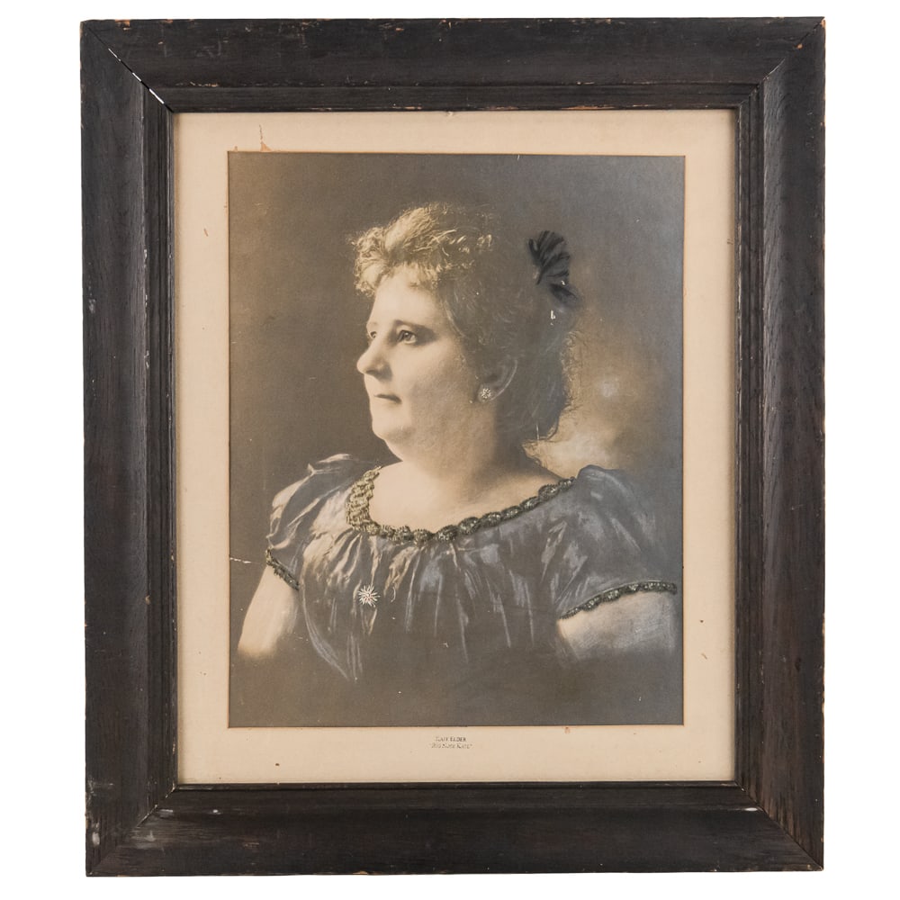 Big Nose Kate Artistic Tribute Portrait Framed: This item is a compelling large-format artistic rendering of the frontier legend Mary Katherine Horony-Cummings, famously known as "Big Nose Kate." This specific piece is a commemorative display