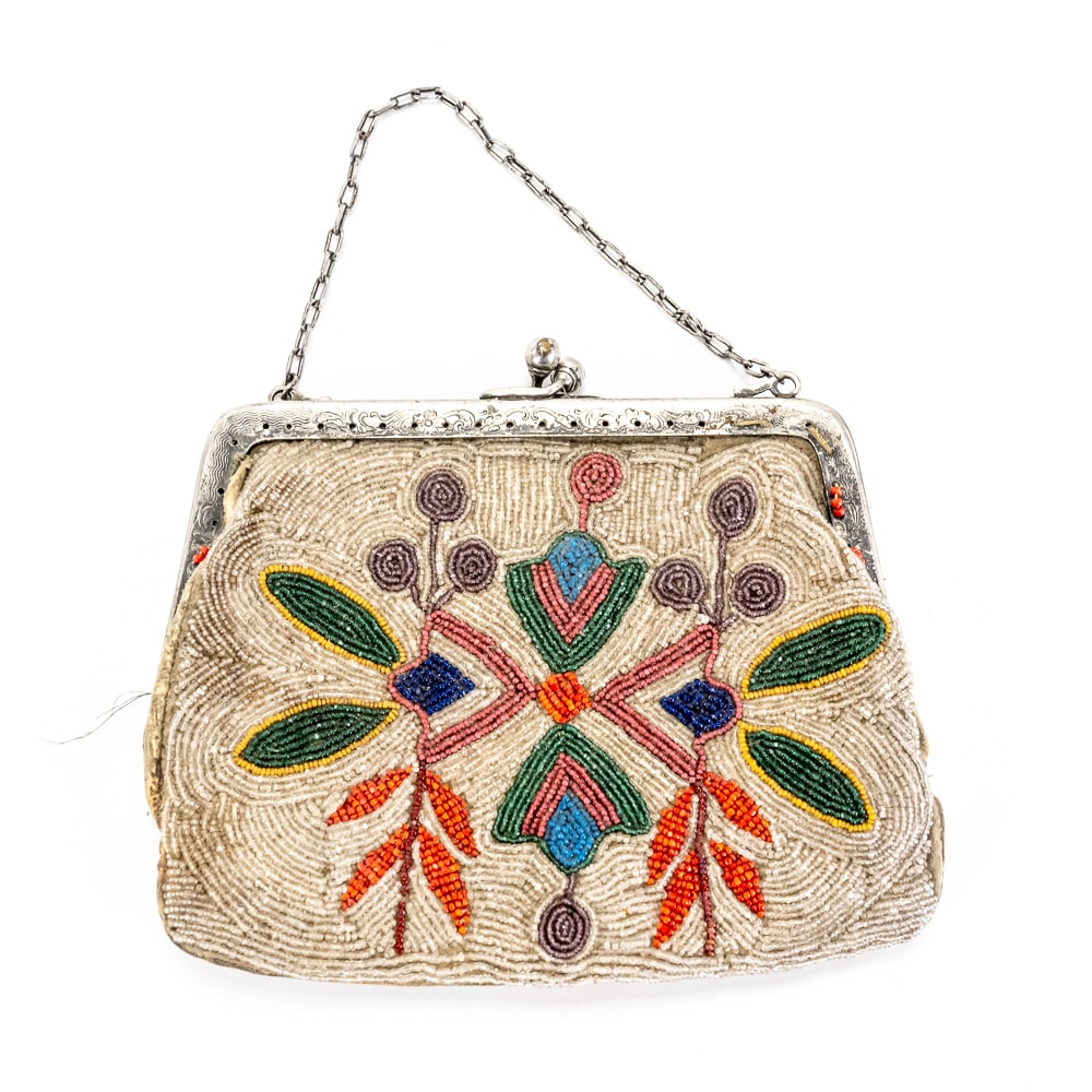 Antique Native American Style Beaded Bag: This exquisite late 19th to early 20th-century evening bag showcases the transition between traditional indigenous artistry and Victorian-era fashion. The piece features intricate glass seed beadwork