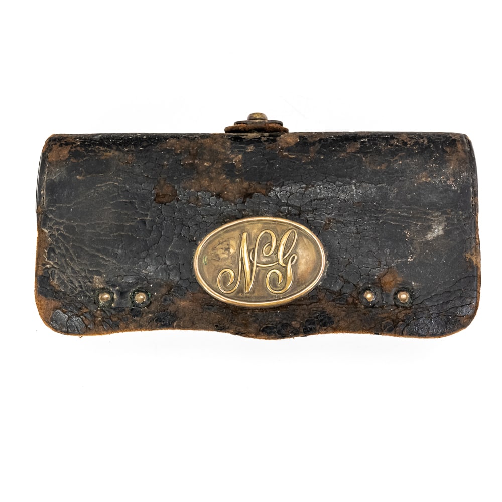 Frazier Patent 1872 Cartridge Pouch: This is a remarkable late 19th-century leather cavalry cartridge pouch, specifically featuring the Frazier Patent and manufactured by McKenney & Co. of New York. The patent dates