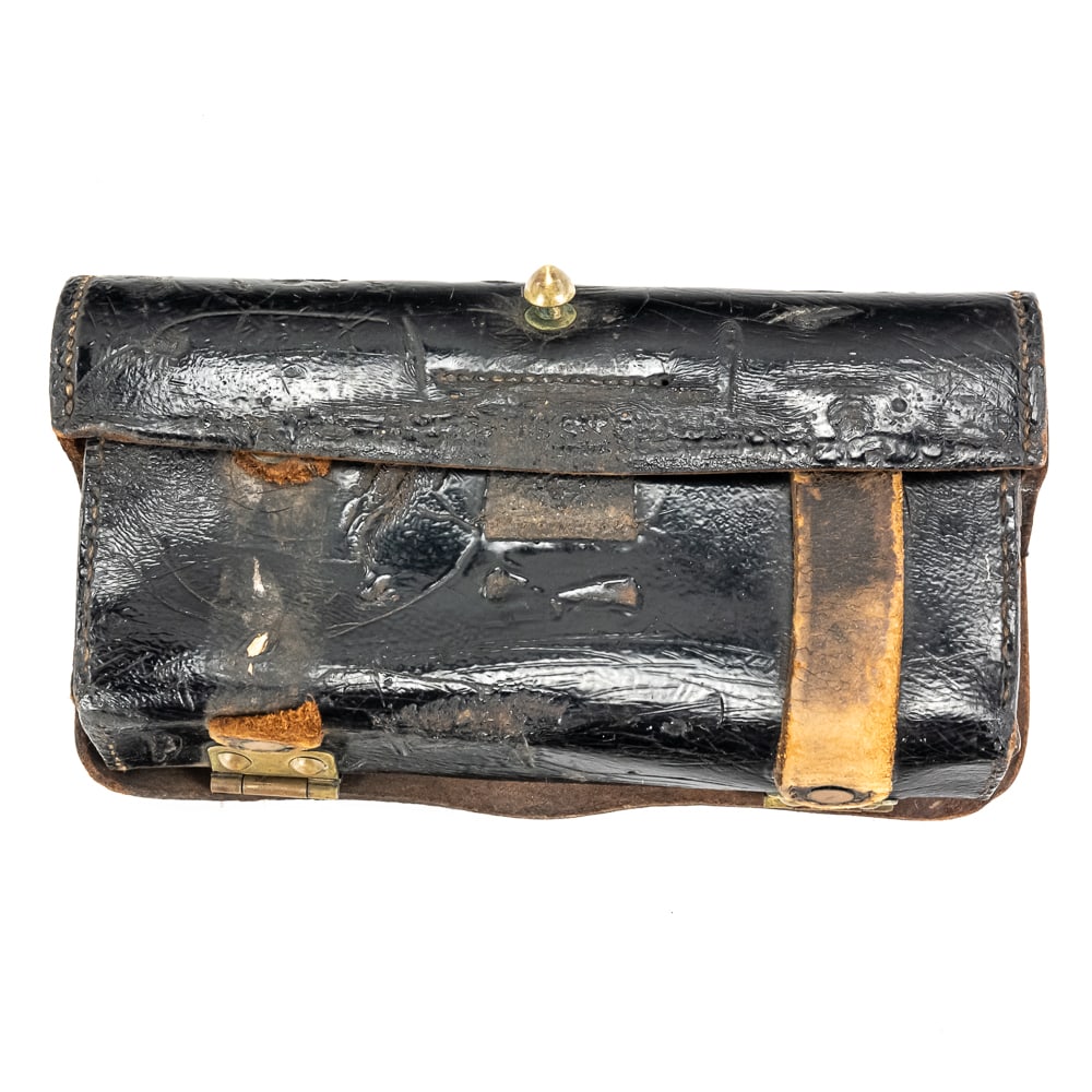 NY State Signal Corps Frazier Patent Cartridge Box: This historic leather Frazier Patent cartridge box, marked for the Signal Corps 3rd Brigade, N.G.N.Y., is a sophisticated relic of late 19th-century military engineering. Patented by Capt. Douglas