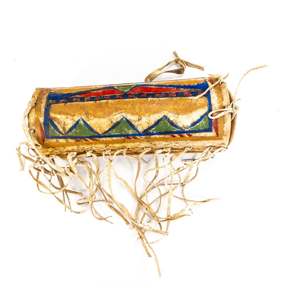 Hand-Painted Plains Cylindrical Parfleche Box: This striking Plains-style parfleche box is a wonderful example of traditional-style hide work, featuring vibrant geometric motifs in red, yellow, green, and blue. Constructed from stiff, folded
