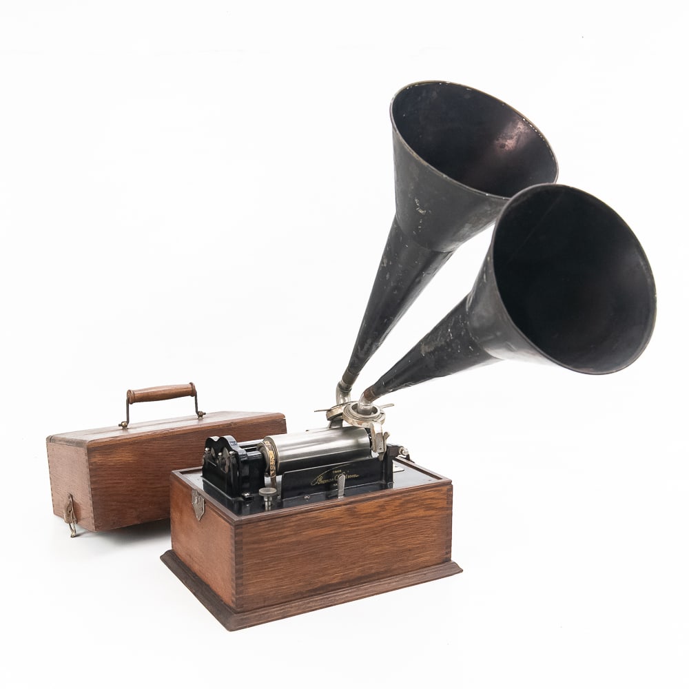 2 Latch Edison Standard Polyphone: A 2 latch Edison Standard cylinder phonograph with a Polyphone attachment and 2 original horns. The Polyphone attachment was an aftermarket modification designed for early cylinder phonographs. It was